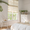 Premium day and night roller blinds with dual layer zebra fabric in a modern interior - image 1