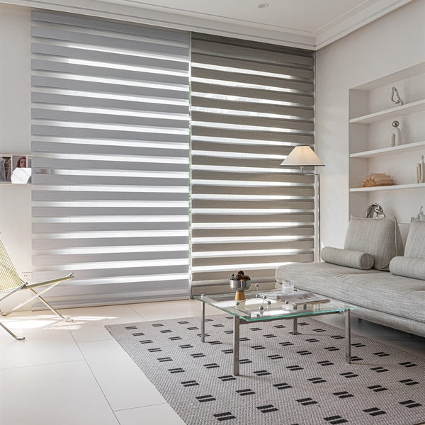 Premium day and night roller blinds with dual layer zebra fabric in a modern interior - image 2