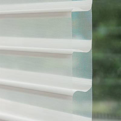 Premium dual layer sheer shades with dual layer zebra fabric in a modern interior - image 3