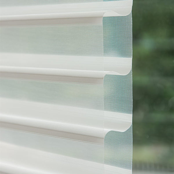 Premium dual layer sheer shades with dual layer zebra fabric in a modern interior - image 3